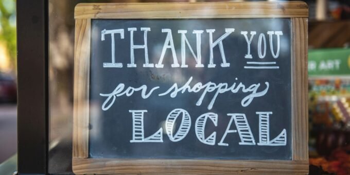 shallow focus photo of thank you for shopping signage